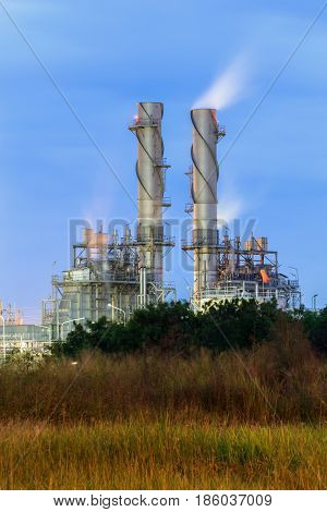 Gas turbine electrical power plant with blue sky at dusk