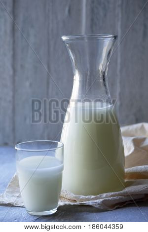 Homemade serum in a Pitcher in rustic style