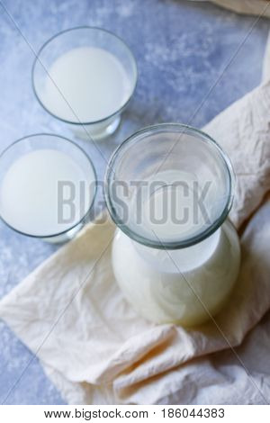 Homemade serum in a Pitcher in rustic style. Top view