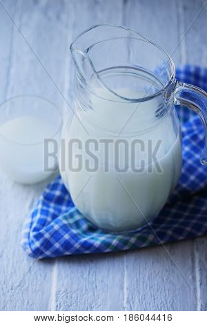 Homemade serum in a Pitcher in rustic style