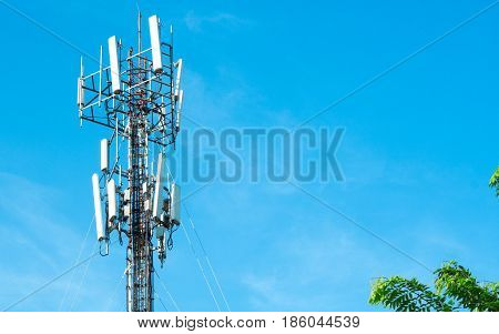 Communication cell phone and background concept - Cell phone antenna with blue sky and could with copyspace