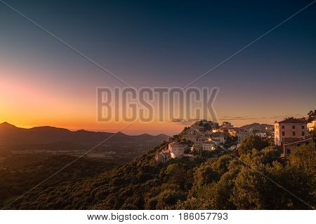 Village Of Belgodere In Corsica Lit By Dramatic Sunset