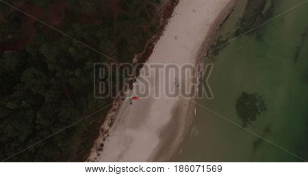Aerial view of Baltic sea shore, waves and sandy beach. Lubiatowo, Poland