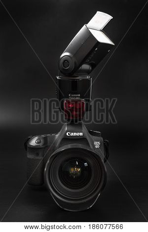 GOMEL BELARUS - May 12 2017: Canon 6d camera with lens on a black background. Canon is the world's largest SLR camera manufacturer