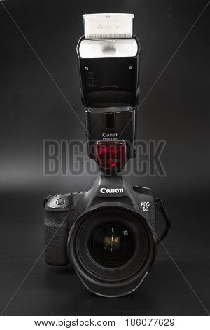 GOMEL BELARUS - May 12 2017: Canon 6d camera with lens on a black background. Canon is the world's largest SLR camera manufacturer