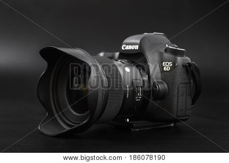 GOMEL BELARUS - May 12 2017: Canon 6d camera with lens on a black background. Canon is the world's largest SLR camera manufacturer