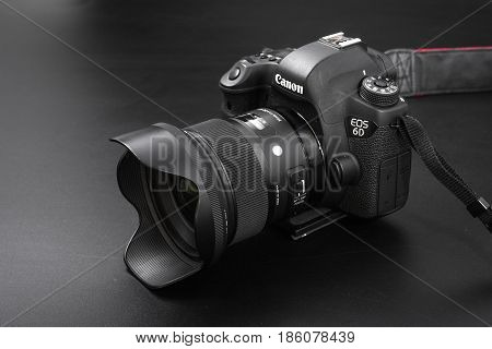 GOMEL BELARUS - May 12 2017: Canon 6d camera with lens on a black background. Canon is the world's largest SLR camera manufacturer