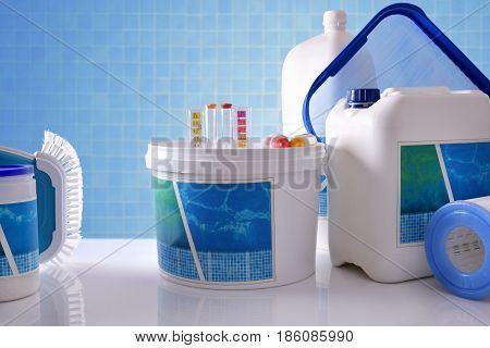 Chemical Cleaning Products For Pool With Blue Mosaic Background