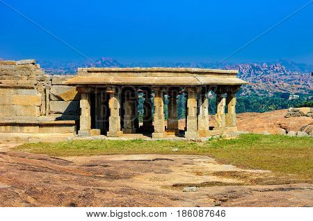 View from Hemakuta hill sunset point with ancient ruins Hampi, Karnataka, India. Landscape with unique mountain formation with amazing stones tropical nature and temple. UNESCO World Heritage Site