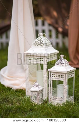 Beautiful Wedding Ceremony Outdoors. Decorated Chairs Stand On The Grass. Wedding Arch Made  Flowers