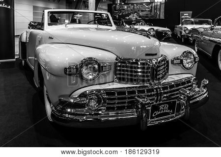 STUTTGART GERMANY - MARCH 02 2017: Personal luxury car Lincoln Continental cabriolet 1948. Black and white. Europe's greatest classic car exhibition 