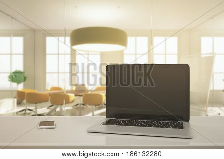 Close up of empty laptop in modern conference room. Mock up 3D Rendering