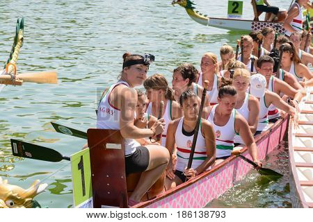 Rome Italy - July 30 2016: Dragon boat crews compete at the european championships held in Italy in 2016 summer in the photo a girl of the Hungary crew is smiling after race