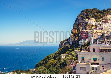Scenic View Of Colorful Houses On Capri Island With Vesuvio Background
