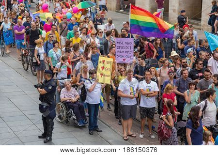 ZAGREB, CROATIA - JUNE 11, 2016: 15th Zagreb pride. LGBTIQ activists on Illica street heading to main square.