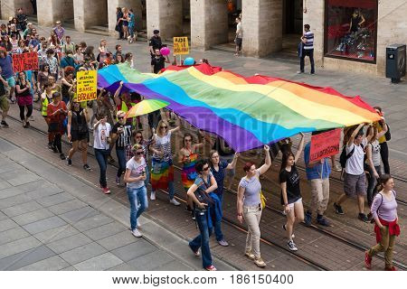 ZAGREB, CROATIA - JUNE 11, 2016: 15th Zagreb pride. LGBTIQ activists on Illica street heading to main square.
