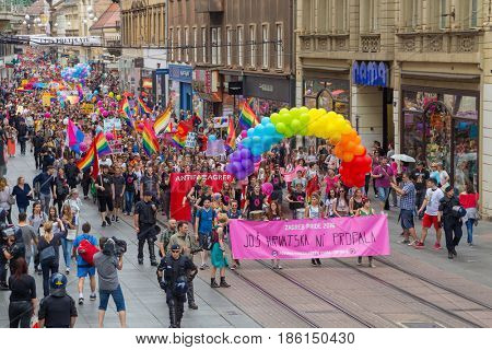 ZAGREB, CROATIA - JUNE 11, 2016: 15th Zagreb pride. LGBTIQ activists on Illica street heading to main square.