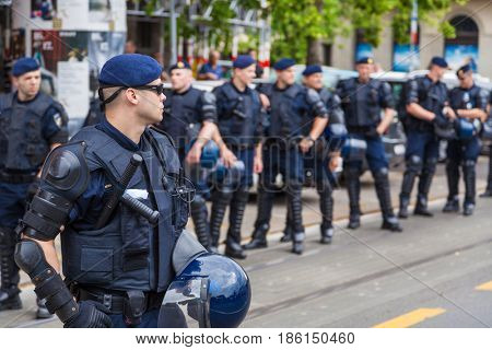 ZAGREB, CROATIA - JUNE 11, 2016: 15th Zagreb pride. Intervention policemen in front of Mimara museum securing LGBTIQ activists and supporters during the gay pride.