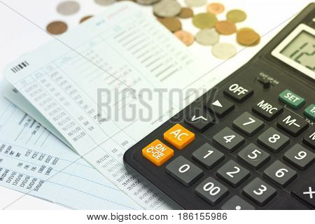 Calculate, Bank account and coins on white background.