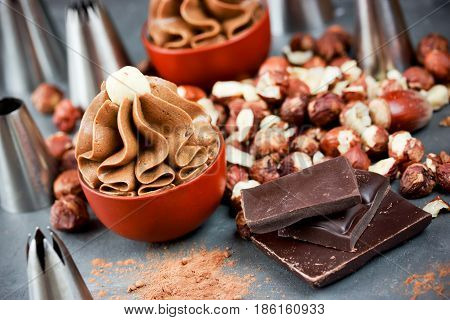 Chocolate mousse or frosting with hazelnut and cocoa