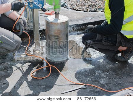 Core drilling for ventilation through a building ceiling