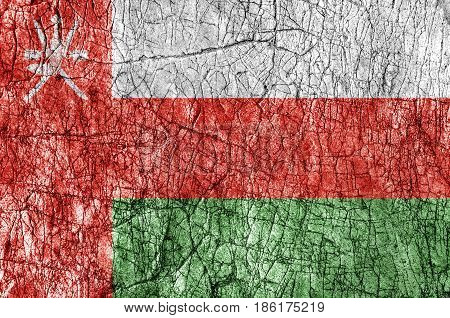 Grudge stone painted Oman flag close up