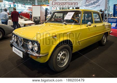 STUTTGART GERMANY - MARCH 02 2017: Large family car Alfa Romeo Giulia Nuova Super 1975. Europe's greatest classic car exhibition 