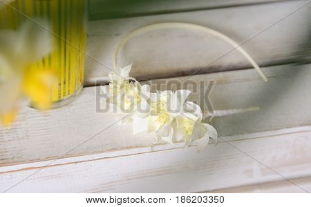 white daffodils with butterflies, spring background of flowers.