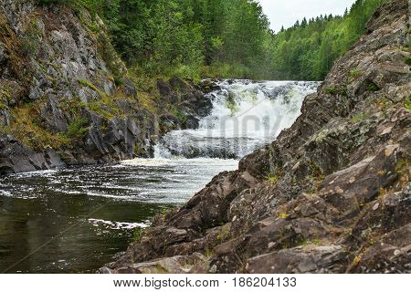 Kivach waterfall among rocksin the summer, Russia