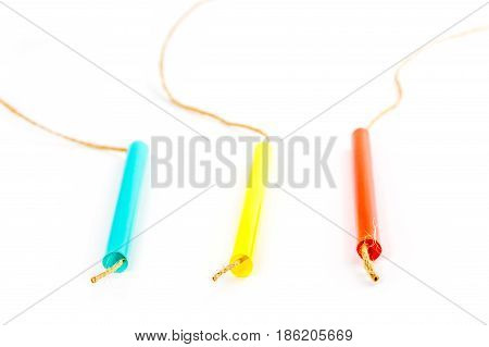 three different colored straws wich represent three differrent ways how to solve a problem o which way to go
