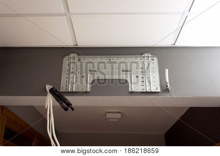 Air conditioner installation servicing indoor with connection cables tubes inside office and home on a gray wall ac service for best filter efficiency and pure air ventilation