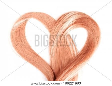 Strawberry blonde hair on white background