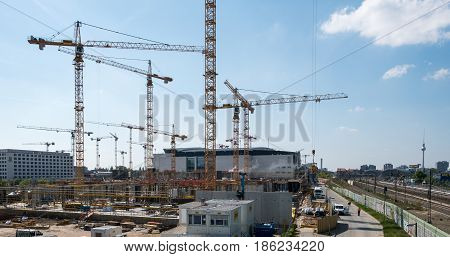 Cranes And Construction Workers Onconstruction Site