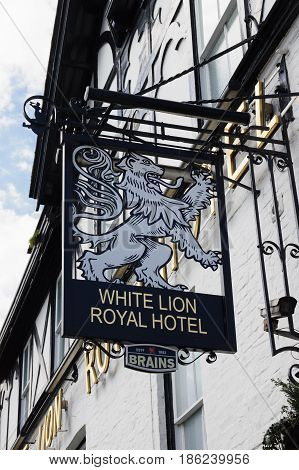 Bala Wales UK - May 3 2017: Traditional style pub sign outside the White Lion Royal Hotel pictorial signs date back hundred of years and where used to identify inns as an early form of advertising