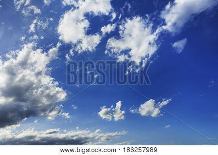 blue sky background with a tiny clouds