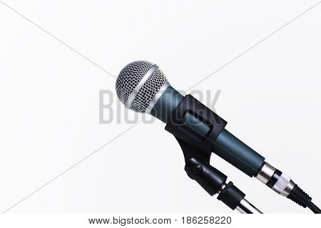 side view of microphone on a white background with copy space