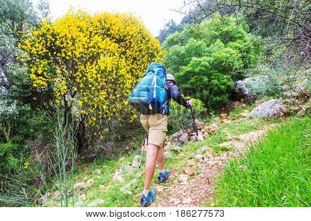 Hiking in famous Lycian Way in the Turkey. Backpacker in the trail.