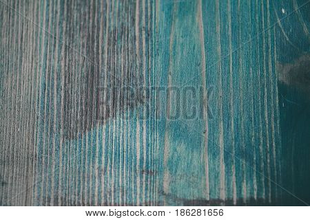 Navy blue wood texture. Turquoise wood background. Closeup view of blue wood texture and background. Abstract background and texture for designers. Texture of vintage handmade table. Rustic table.