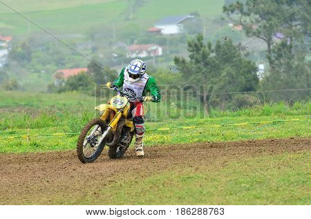 Unidentified Racer Rides A Classic Motorcycle.