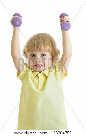 Cute child with dumbbells. Portrait of sporty kid boy in yellow t-shirt isolated on white background.