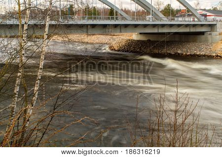 Russia. The Leningrad Region. Losevo. Bridge over the river Vuoksa with river rapids