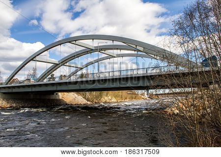 Russia. The Leningrad Region. Losevo. Bridge over the river Vuoksa with river rapids