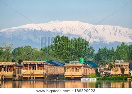 Srinagar India - April 25 2017 : Lifestyle in Dal lake People living in 'House boat' and using small boat 'Shikara' for transportation