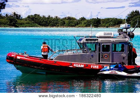 Tamon Guam Island October 31 2015: Island of Guam Fire Rescue boat in the Tamon harbor on October 31th 2015