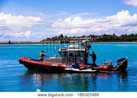 Tamon Guam Island October 31 2015: Island of Guam Fire Rescue boat in the Tamon harbor on October 31th 2015