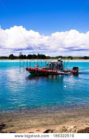 Tamon Guam Island October 31 2015: Island of Guam Fire Rescue boat in the Tamon harbor on October 31th 2015