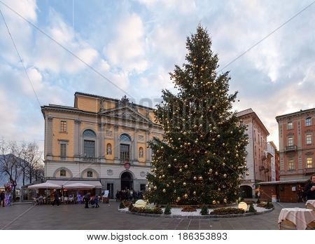 Christmas Market With Huts Lit And Decorated