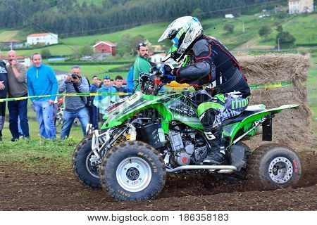 Unidentified Racers Rides A Quad Motorbike.
