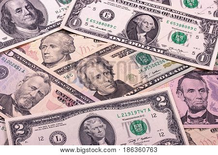 Abstract Dollar Bills Of Different Denominations Background.