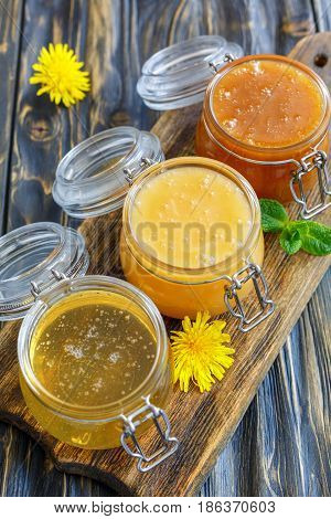 Linden,flower And Buckwheat Honey In Jars.
